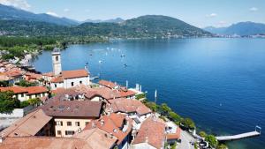 an aerial view of a town on a lake at La Bretonne in Feriolo