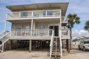 a house on the beach with a balcony at Direct Gulf Views with Deeded Beach Access (#17) - Sleeps 7 in Gulf Shores