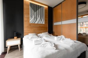Posteľ alebo postele v izbe v ubytovaní Apartamenty Pod Giewontem Lux&Spa Zakopane