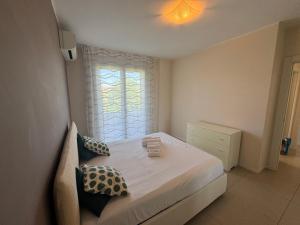 Postel nebo postele na pokoji v ubytování Rho Fiera Comfort Apartment - Affitti Brevi Italia