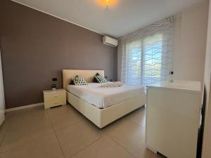 Postel nebo postele na pokoji v ubytování Rho Fiera Comfort Apartment - Affitti Brevi Italia