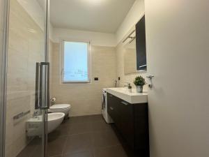 Koupelna v ubytování Rho Fiera Comfort Apartment - Affitti Brevi Italia + 24 fotografií