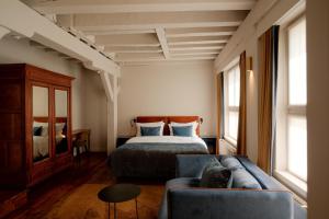 Letto o letti in una camera di Hotel 'T Sandt