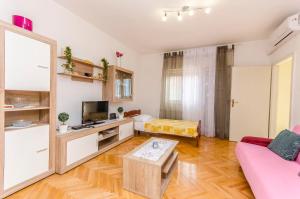 Kuchyň nebo kuchyňský kout v ubytování Apartment Sime