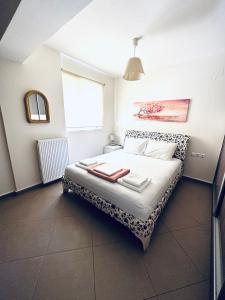 Кровать или кровати в номере The little palace next to the sea