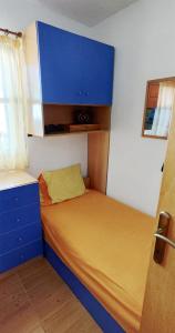 A bed or beds in a room at Wooden beach house / Nea Roda, Halkidiki
