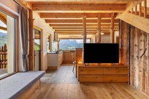 TV in/ali zabaviščno središče v nastanitvi Weirerhof Lebm Gspiarn