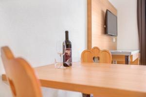 TV a/nebo společenská místnost v ubytování Residence krUma