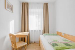 Postel nebo postele na pokoji v ubytování Residence krUma