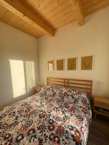 Postel nebo postele na pokoji v ubytování Dalla Chicchi + 12 fotografií