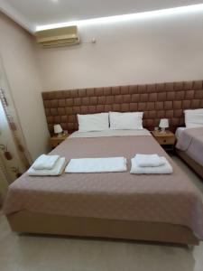 Cama o camas de una habitación en Achilles Apartments