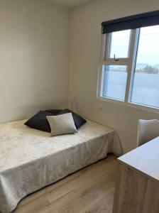 Un ou plusieurs lits dans un hébergement de l'établissement Two bedroom family apartment