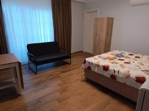 Postel nebo postele na pokoji v ubytování Mihenk Pansiyon