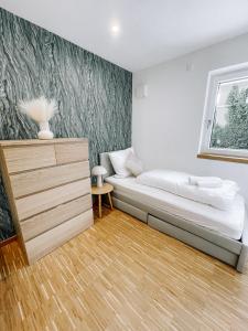Ліжко або ліжка в номері DoreyHome P3 - Modernes charmantes Apartment