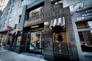 a store front of a building on a city street at EMBASSY HOTEL in San Francisco