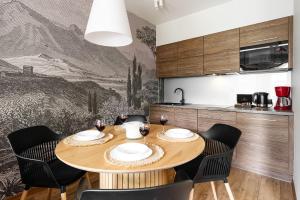 Kuchyňa alebo kuchynka v ubytovaní Apartamenty Pod Giewontem Lux&Spa Zakopane
