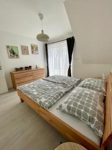 Postel nebo postele na pokoji v ubytování Apartmán Bystřice