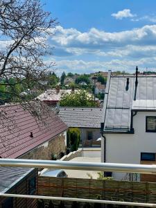 a view from a balcony of a building at Apartmán Bystřice in Bystřice nad Pernštejnem +9 photos