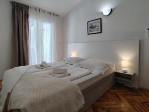Postel nebo postele na pokoji v ubytování Restoran Bartol