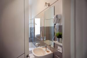 Koupelna v ubytování Aparthotel Le Marine