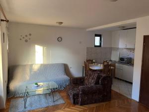 Kuchyň nebo kuchyňský kout v ubytování GOLD Apartman