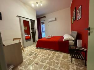 Postel nebo postele na pokoji v ubytování Le Gorgoni b&b