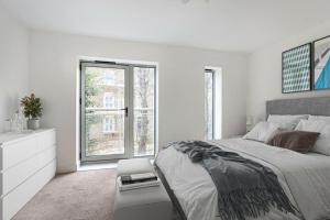 Postel nebo postele na pokoji v ubytování Rochester Lux Stay Townhouse 2