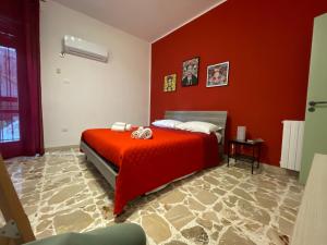 Postel nebo postele na pokoji v ubytování Le Gorgoni b&b