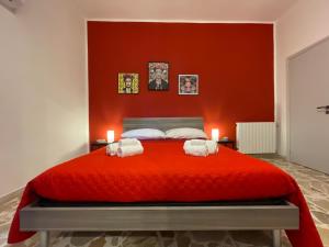 Postel nebo postele na pokoji v ubytování Le Gorgoni b&b
