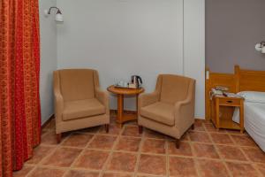 Posteľ alebo postele v izbe v ubytovaní Hotel La Fragua II
