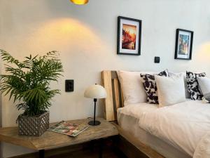 Ένα ή περισσότερα κρεβάτια σε δωμάτιο στο Lovely view apartments +33 φωτογραφίες