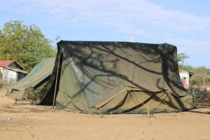 a tent sitting on top of a dirt field at Popo Camp Lake Baringo in Ol Kokwe