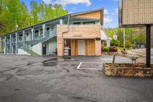 an empty parking lot in front of a building at Country Town N' Suites in Gatlinburg