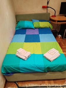 A bed or beds in a room at Ameno house