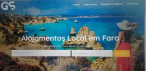 a website for a tourism company with a picture of a lake at Grand studio 29 in Faro