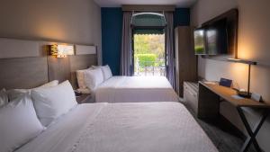 Un pat sau paturi într-o cameră la Holiday Inn Express Morelia Centro Historico