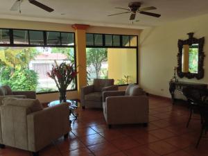 Zona de estar de Hotel Brandts Los Robles de San Juan