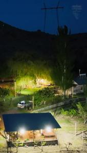 a car parked in a parking lot at night at GreenField GH in Yeghegnadzor