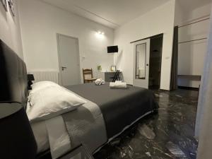 Postel nebo postele na pokoji v ubytování Le Gorgoni b&b