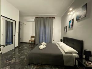 Postel nebo postele na pokoji v ubytování Le Gorgoni b&b