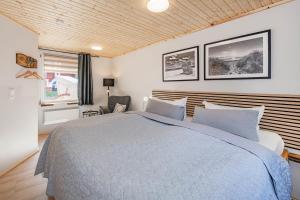 Postel nebo postele na pokoji v ubytování Strandläufer