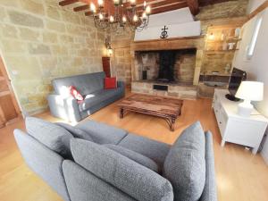 Coin salon dans l'établissement Maison de Village 18ème Siècle Familiale 3 Chambres