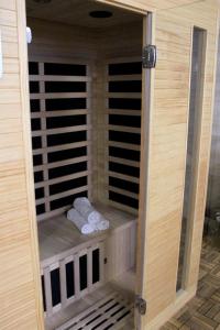a sauna with two towels in a room at Apartmanový dom Stummerova in Topoľčany