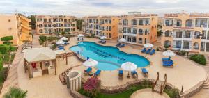 an aerial view of a swimming pool at a resort at Beautiful Apartment in Egyptian Experience Resort in Sharm El Sheikh