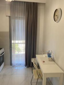 Kuchyň nebo kuchyňský kout v ubytování Vasilev Apartment, Nea Kallikratia