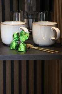 Huisje Wenum - Apeldoorn met jacuzzi的咖啡和沏茶工具