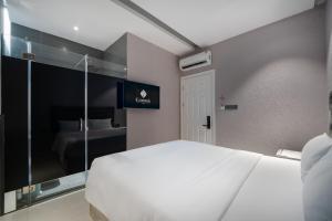 Televisi dan/atau pusat hiburan di Mari Queen Hotel