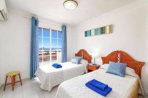 Posteľ alebo postele v izbe v ubytovaní Villa Arco Iris by Villa Plus + 22 fotografií