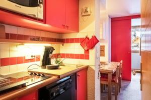 Kuchyňa alebo kuchynka v ubytovaní Résidence Plagne Lauze - maeva Home - Studio 4 personnes - Confort 594
