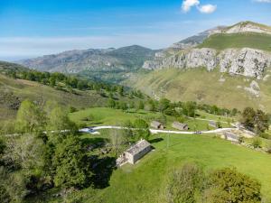 an aerial view of a farm in the mountains at Vivienda pasiega LO LUCAS 1920 in San Roque de Ríomiera